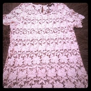 A see through floral shirt